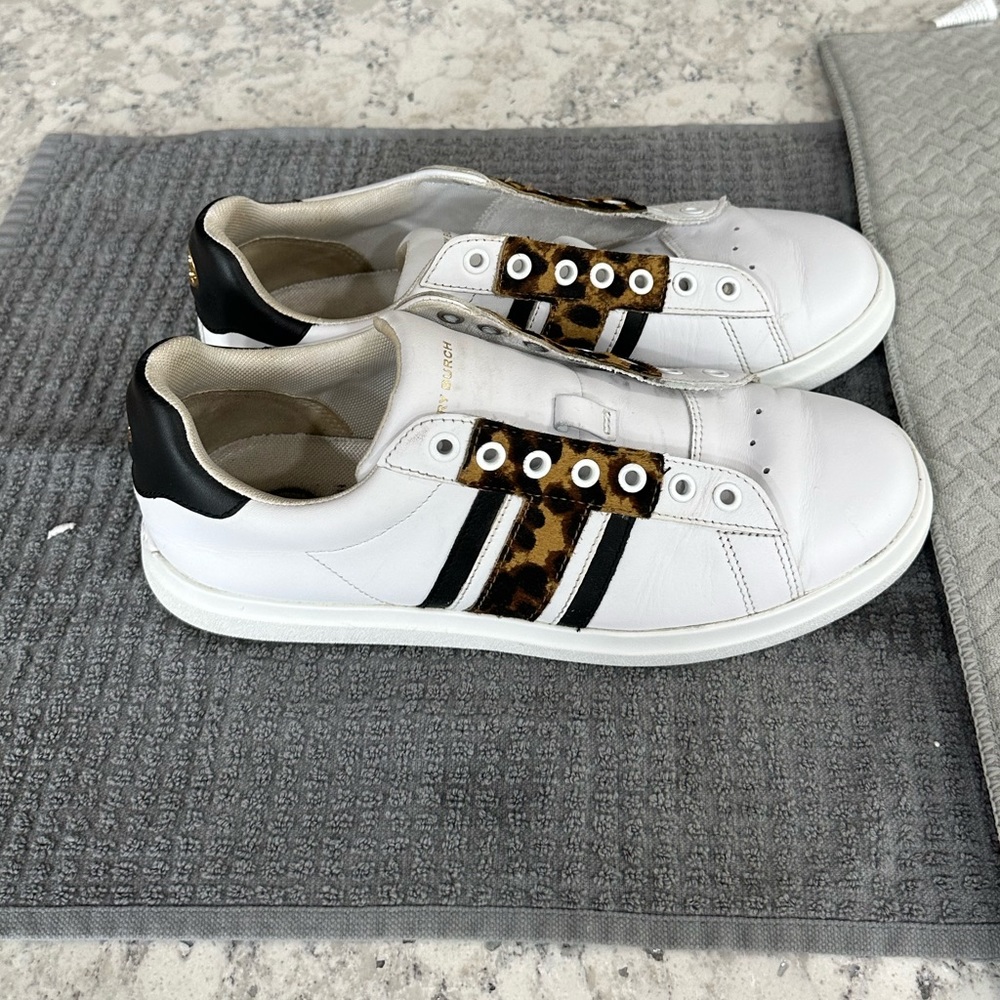 Good used condition, authentic Tory Burch sneakers. Cute leopard print design